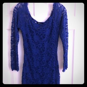 Royal blue form fitting long sleeve lace dress